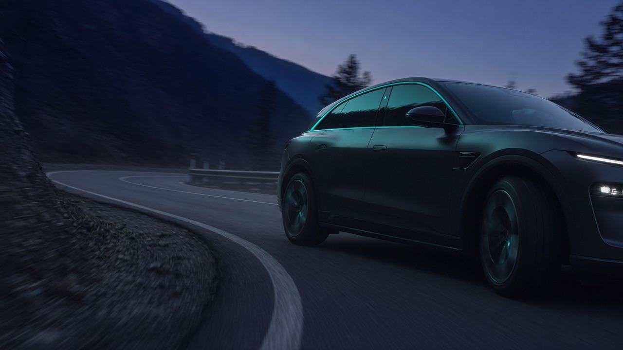 Illustration: a car carving a mountain corner at dusk